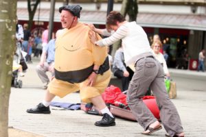 David Price dressed as a sumo wrestler as part of his science made simple busking session held in Vicoria Sqaure in Bolton. 04/07/09